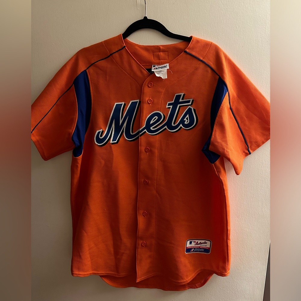 Vintage New York Mets Orange baseball jersey.